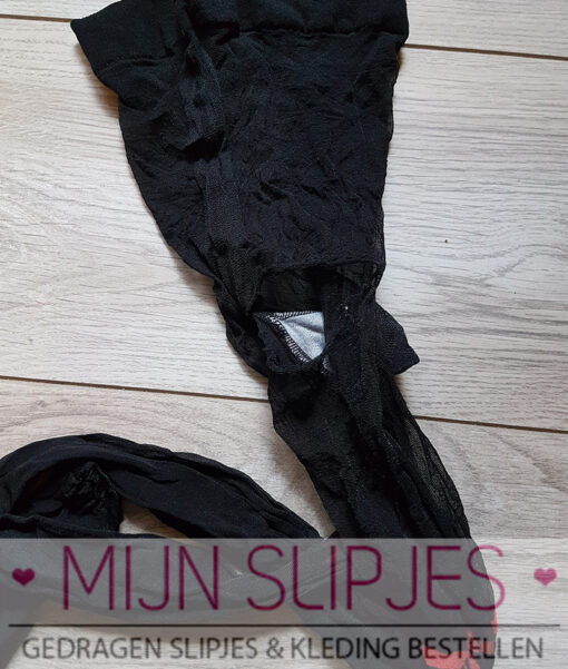 Versleten panty met strikjes op de bovenbenen - Afbeelding 3