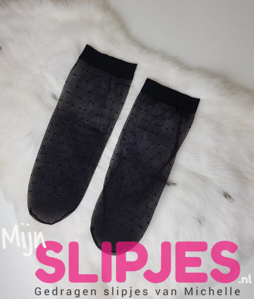 Zwarte pantysokjes met stipjes gedragen voor jou